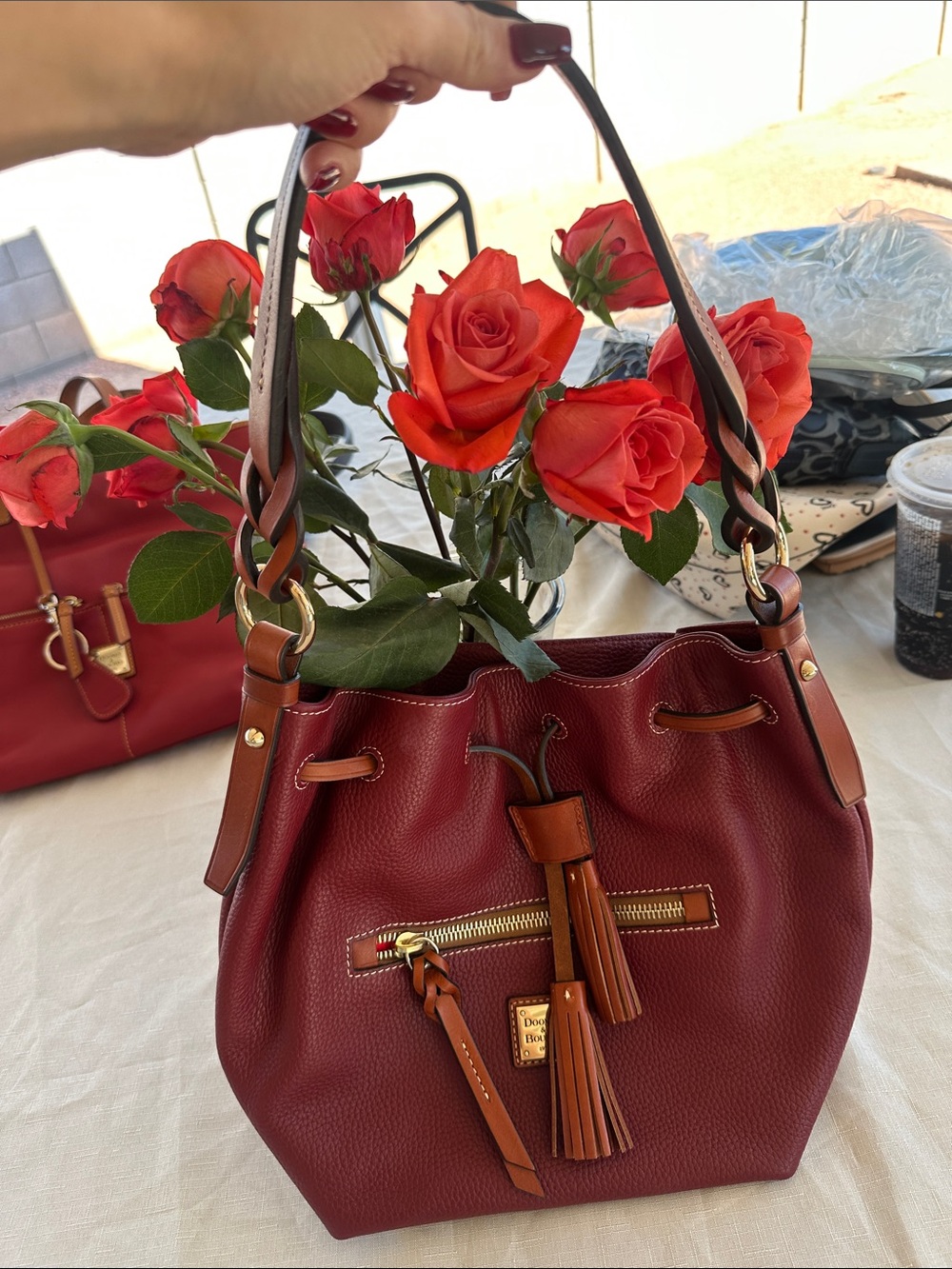 Gorgeous Dooney hobo bucket in red leather